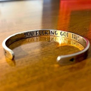 Dangle bracelet with saying inside